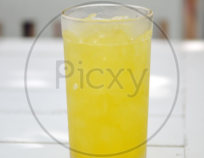 glass of fresh orange juice on a Table