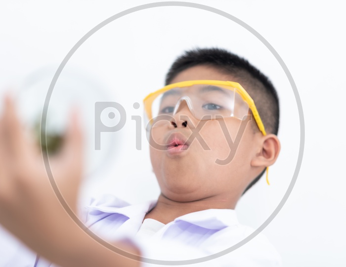 Boy Wearing Laboratory Glasses