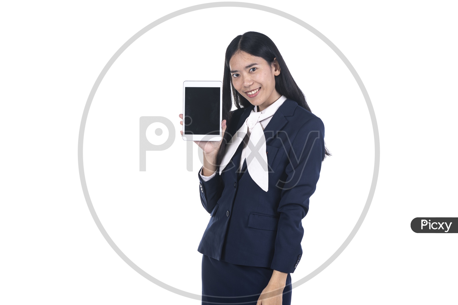 business woman in a suit using a digital tablet ipad on isolated background