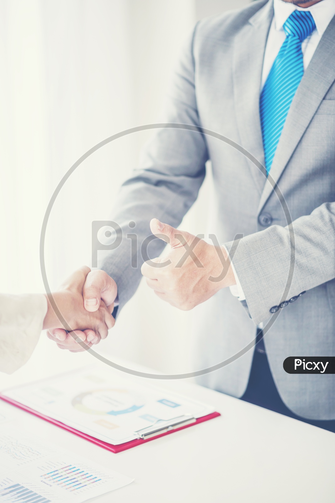 Business Success Greetings Concept With Business Partners Shaking Hands And Thump up Gesture Closeup Hands closeup