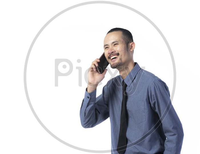 Young Business Man Talking On Smartphone with Smile Face