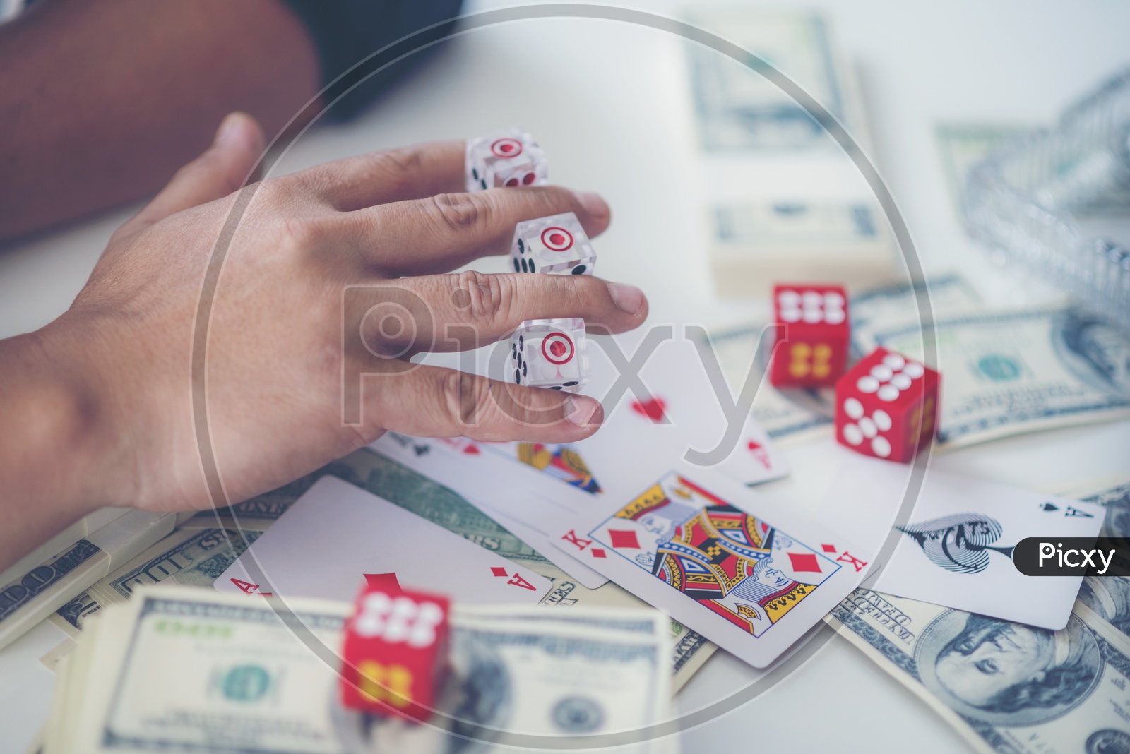 Businessman Holding Dice At office Desk , Gambling in Business Concept
