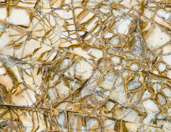 Brown Patterns On a Marble Stone Closeup Forming a Backgroundn