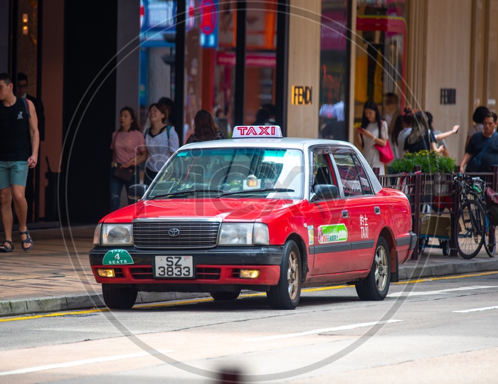 Taxi Cars On the Roads Of Hong Kong City