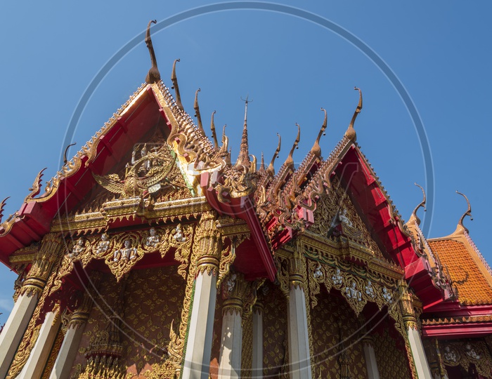 Thai Temple Shrine With Blue Sky Background