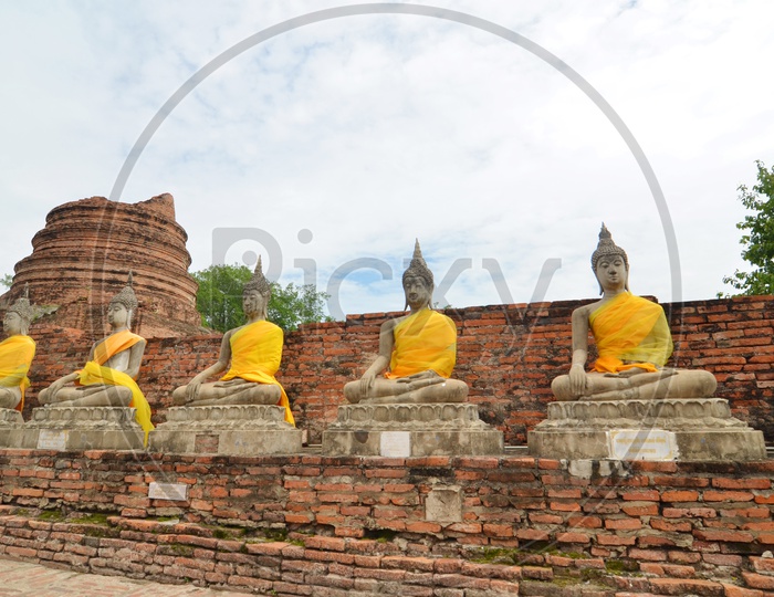 Ancient Buddha statues at the temple of Wat Yai Chai Mongkol in Ayutthaya near Bangkok, Thailand