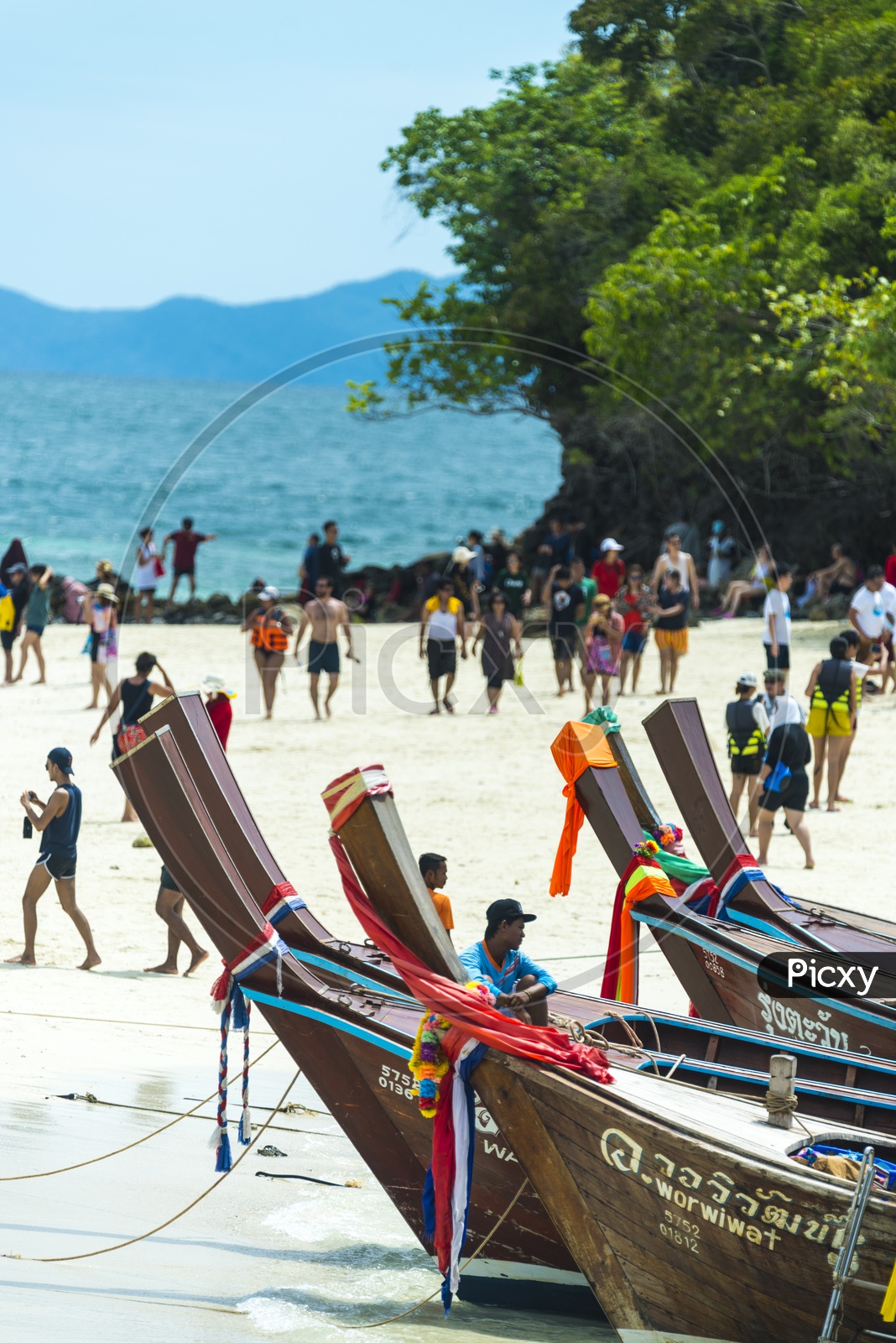 Busy Phuket beach With Tourists