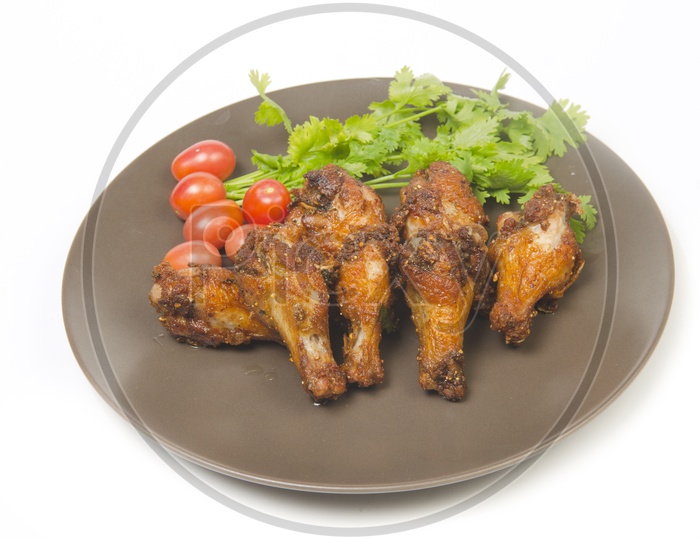 fried chicken Served in a Plate on an  isolated Background