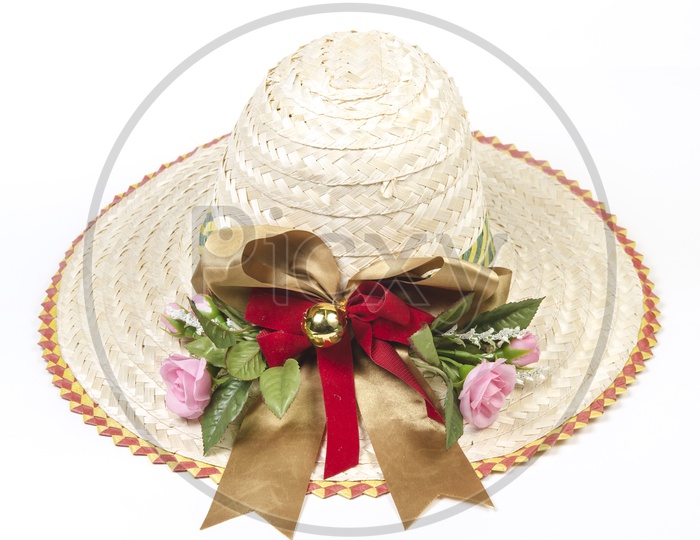 straw summer hat with colorful  flowers on an isolated Background