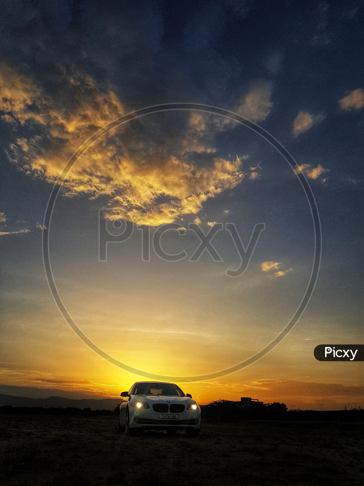 Sunset and a luxury car