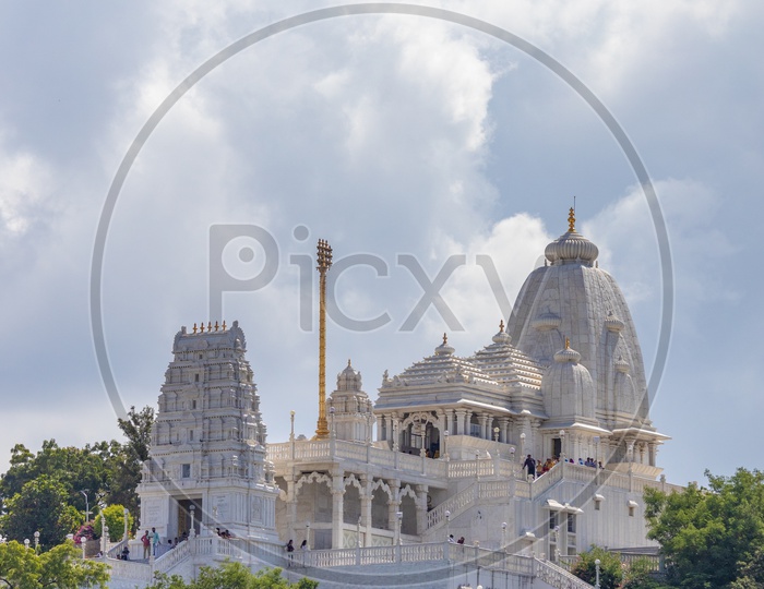 Closeup  of Birla Mandir Temple On Naubath  Pahad  in Hyderabad With Cotton Clouds In Blue Sky