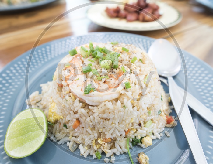 Fried Rice With Shrimp And Garnished With pepper Powder