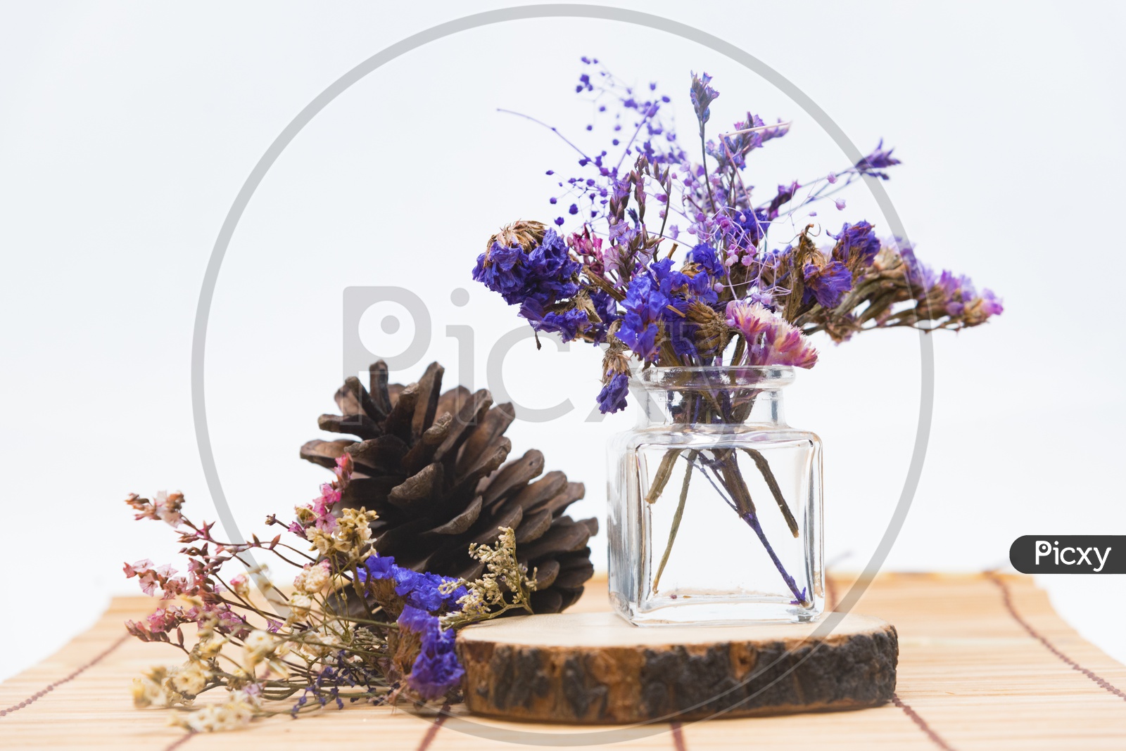 Beautiful vintage flower bouquet in glass vase isolated on white background