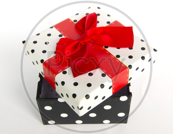 Gift Box With Red Ribbon On an isolated White background