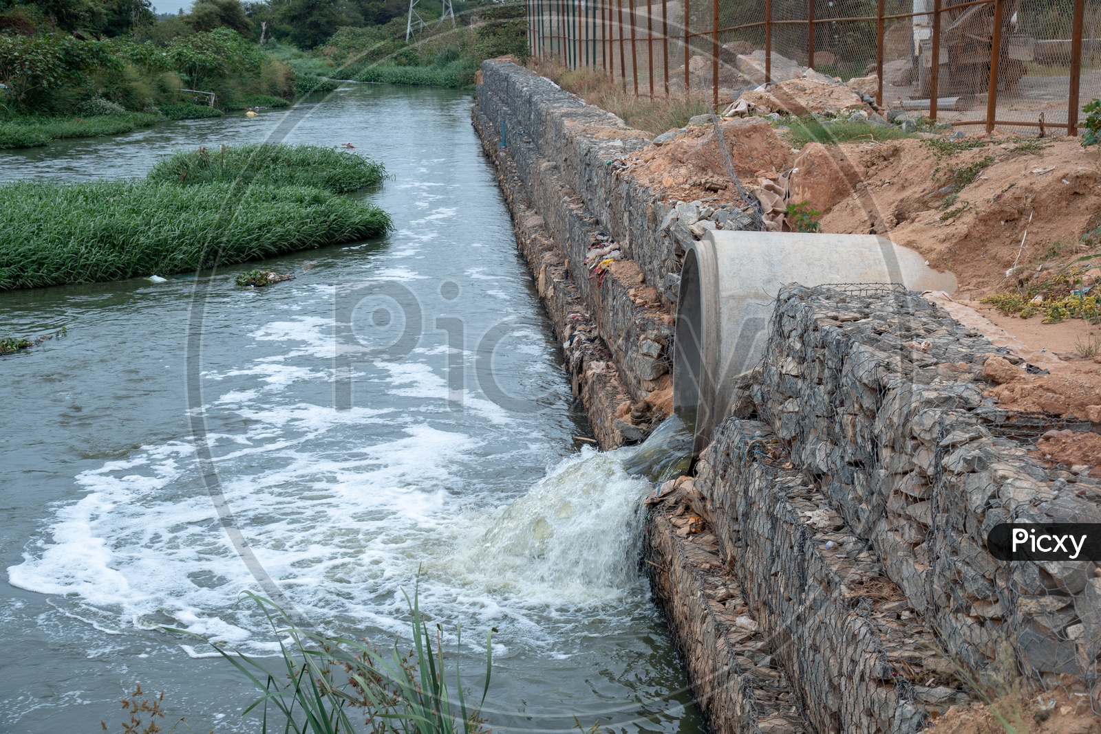 Drain Water or Sewage Water Flowing Into Canal Through Spun Pipes