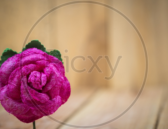 Abstract Background With Artificial Rose Flower Closeup