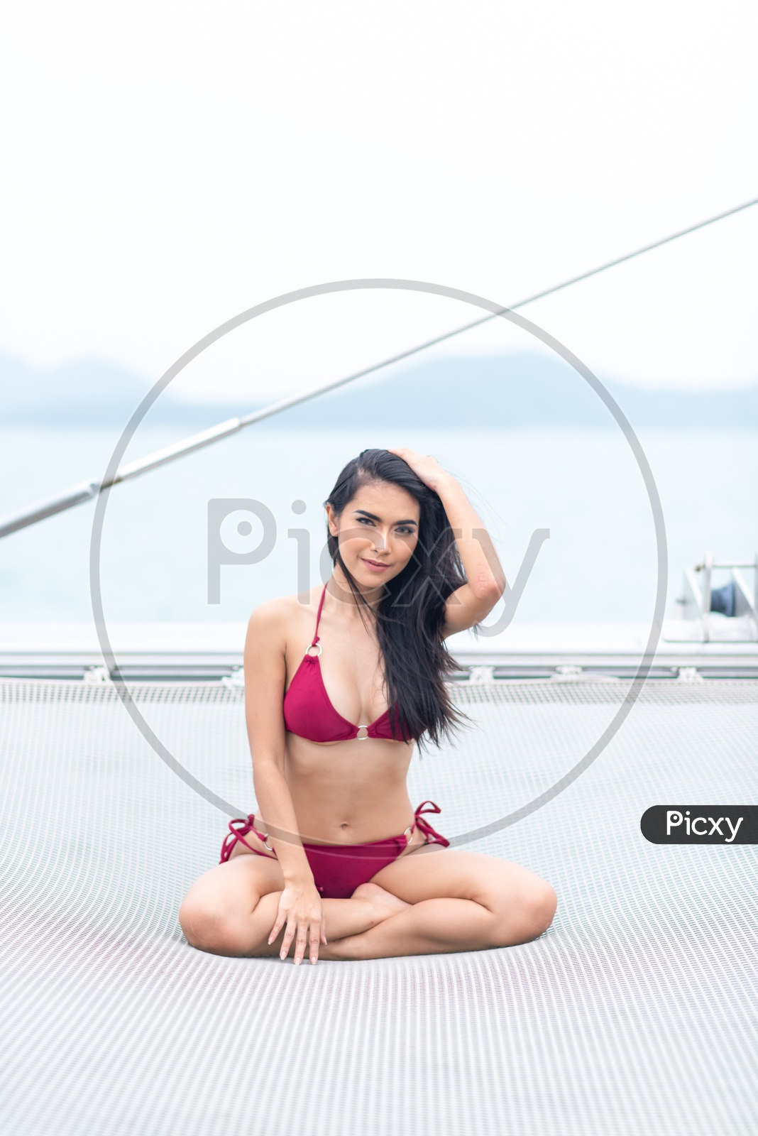 Girl In Red Bikini On Yacht Trip