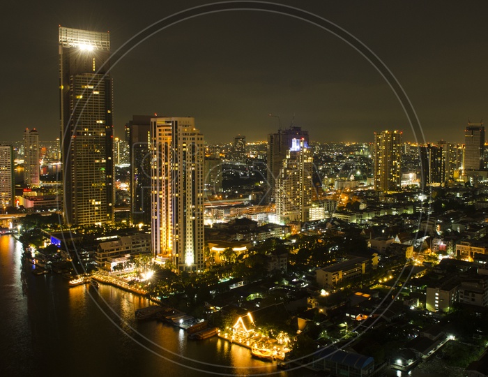 Night City Scape of  Bangkok City With Skyscrapers and River