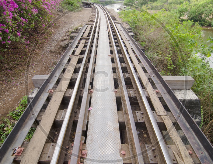Railway Track Built During World War II In Thailand Over River Kwai Closeup View