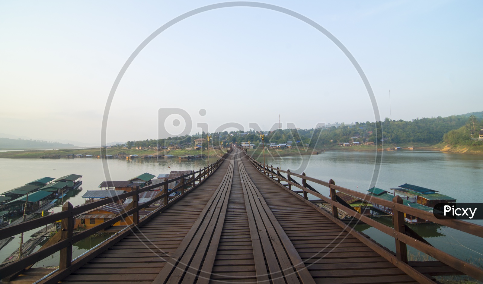 Wood bridge with river and mountain in Kanchanaburi Thailand