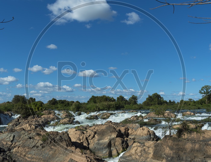 Khone Phapheng Falls With Blue Sky