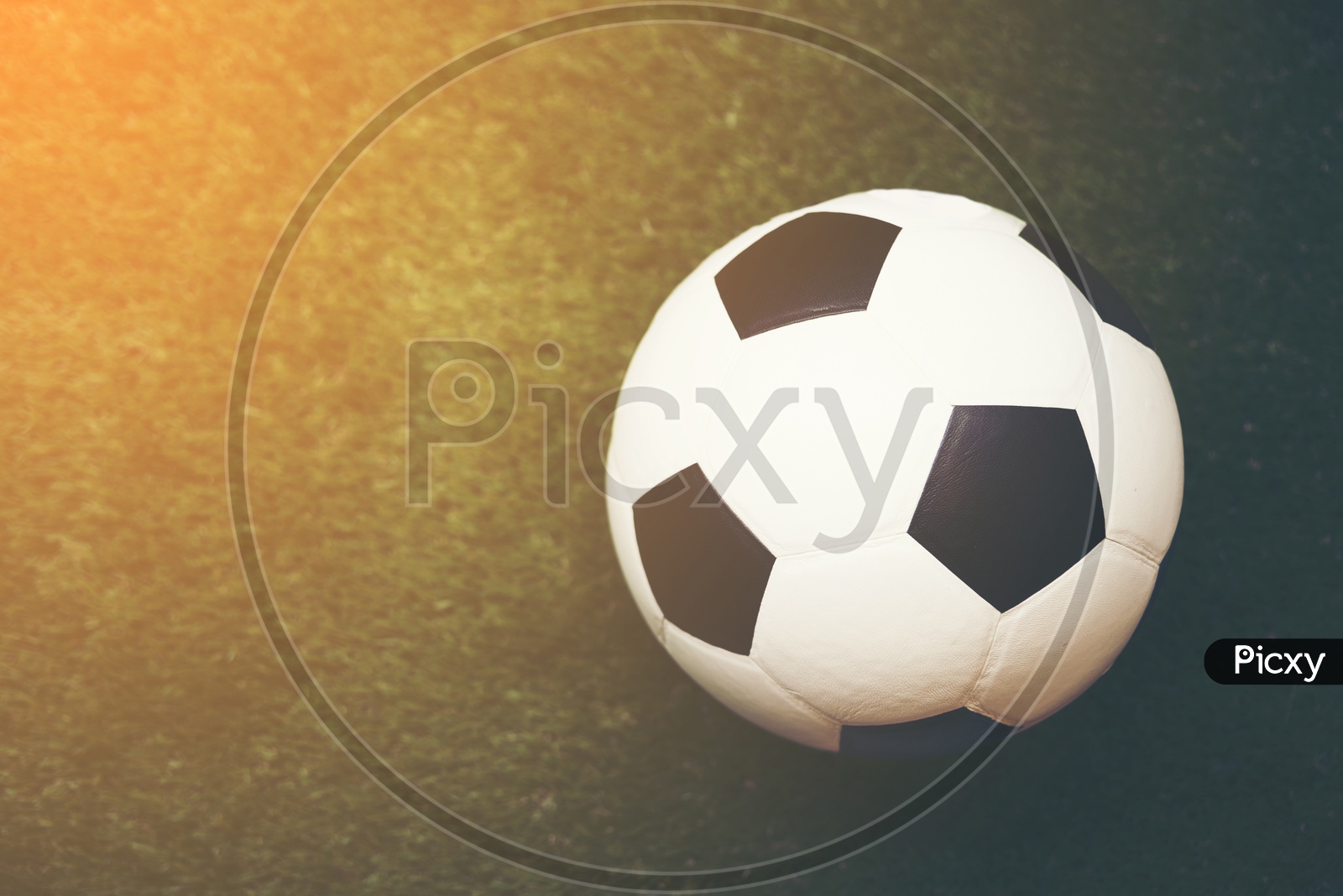 Soccer ball with grass background