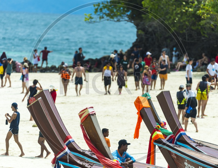 Busy Phuket beach With Tourists