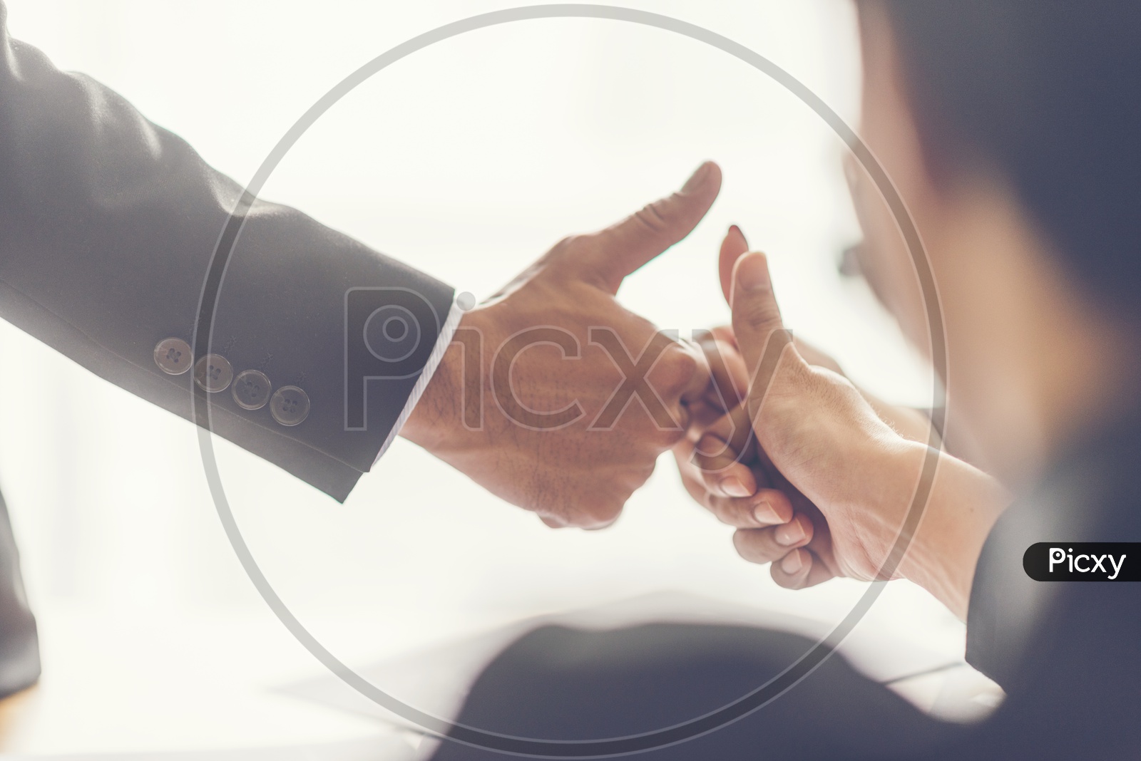 Startup Business Entrepreneurs Joining Hands With Thump Up gesture  In a Business Meeting Hands Closeup