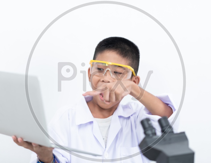 Curious Boy  enjoying learning in the laboratory.