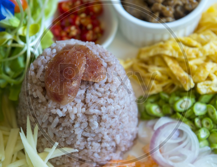 Thai food Rice Platter With Pork and Fresh Veggies