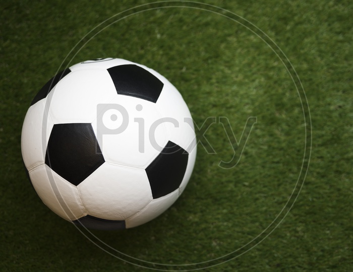 Soccer ball with grass background