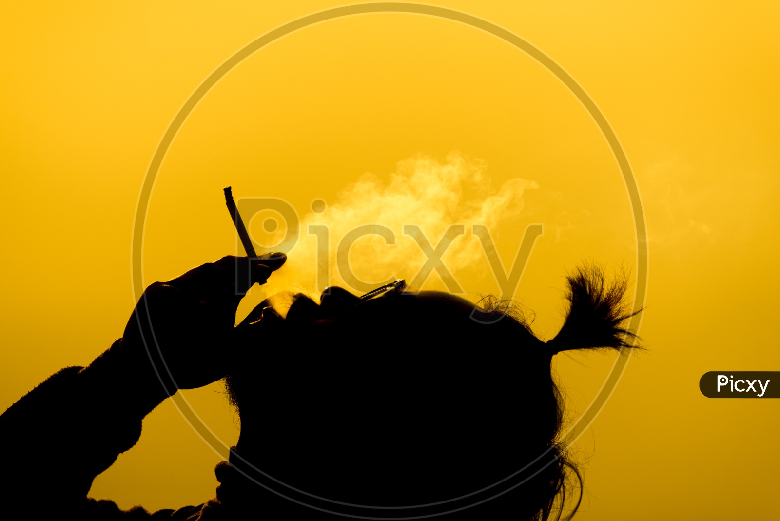 Black silhouette of a Man Smoking Cigarette