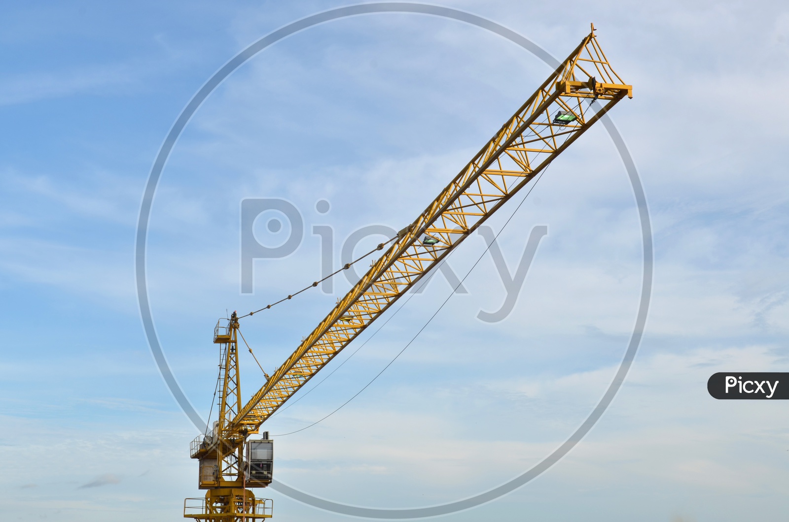 Cranes Working at Building Construction Sites