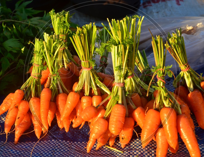fresh carrot Bunches in a Vegetable Vendor Stall