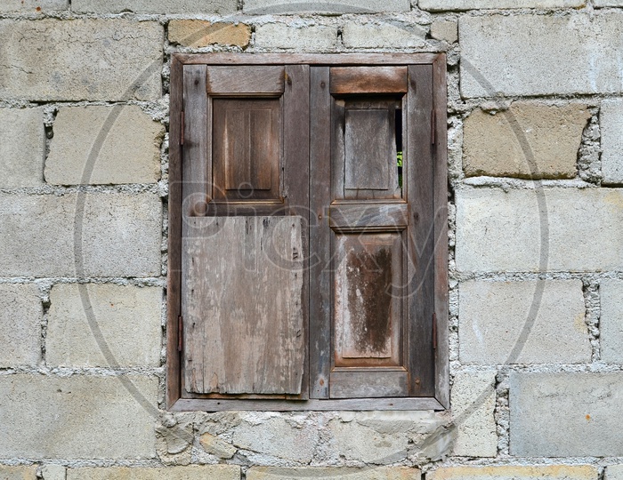 Old Brick Wall With traditional Wooden Window