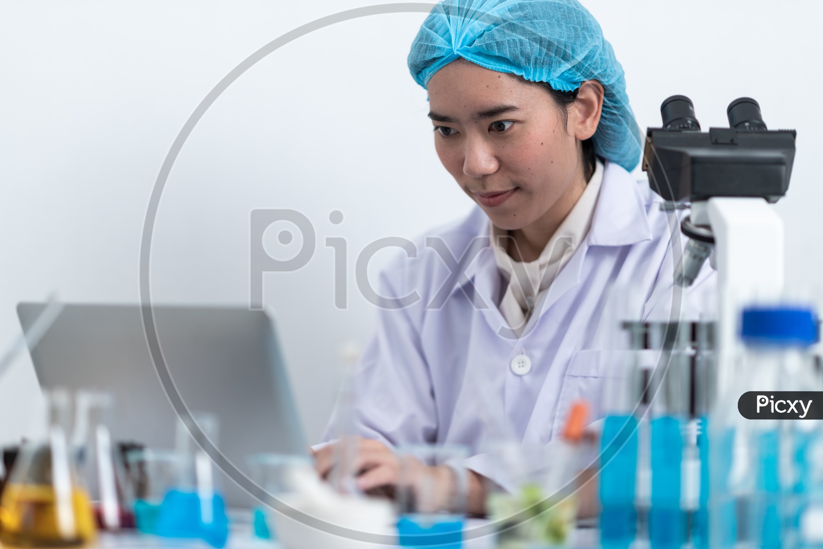 Researcher Or Scientist Using Laptop In a Laboratory