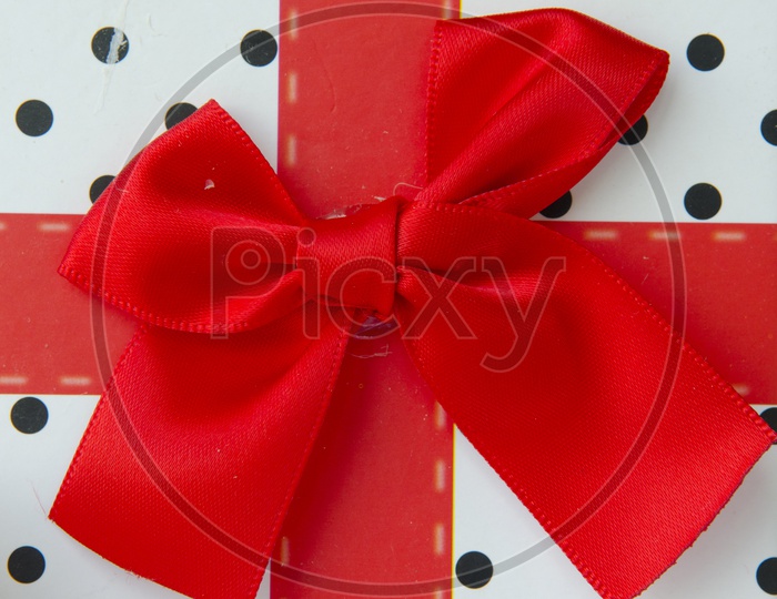 Gift box With red Ribbon a Present for Christmas Closeup