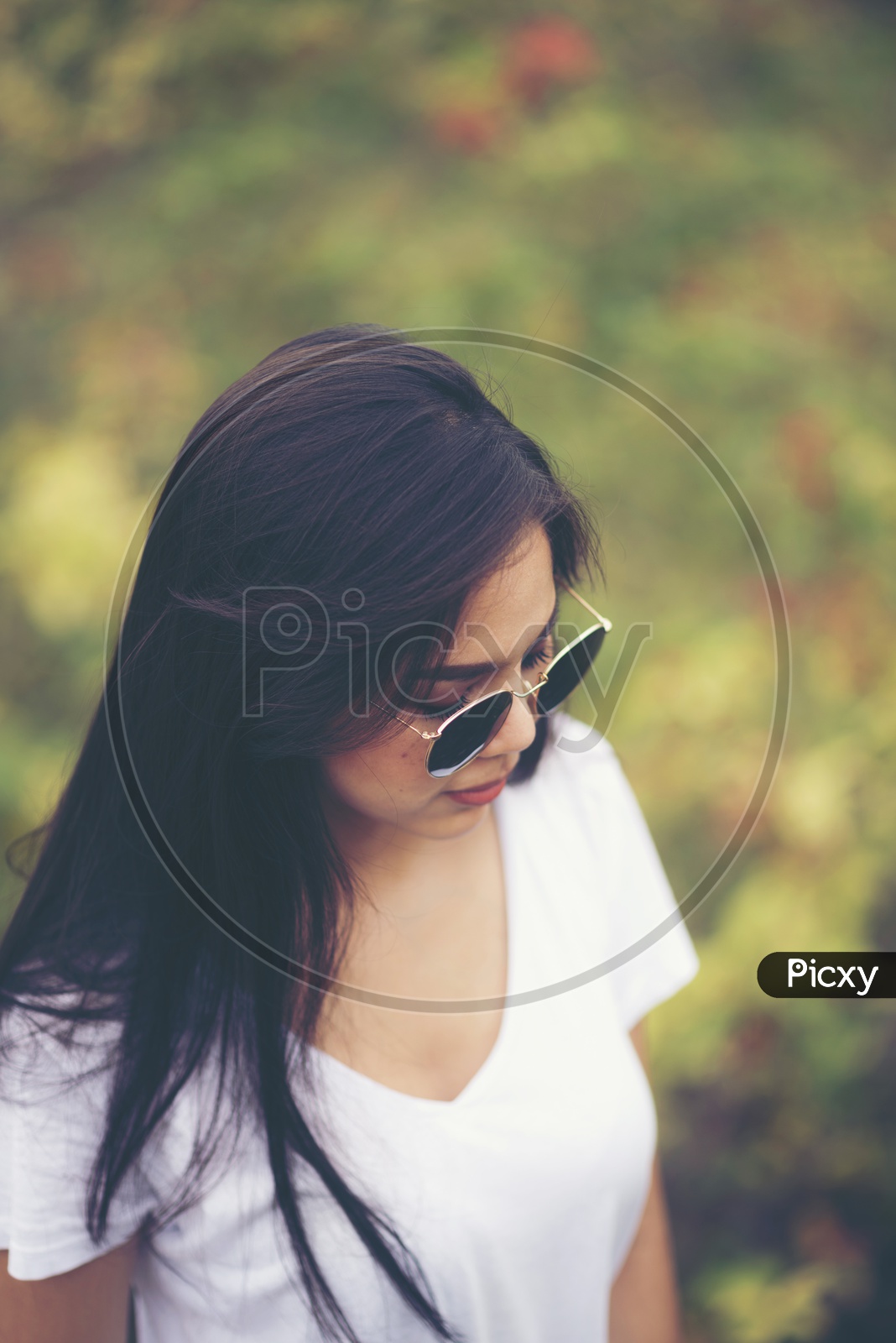 Image of Asian girl in white tee with goggles-VA393395-Picxy