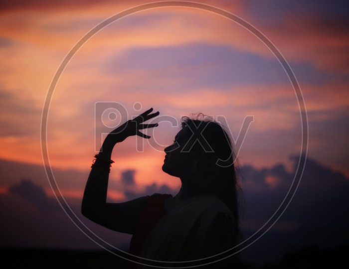 Silhouette of Young Girl Standing Alone, Sad, Depression