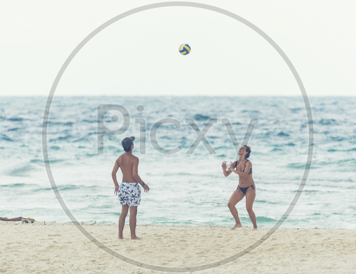Tourists Playing Beach Volleyball In Phuket Beach