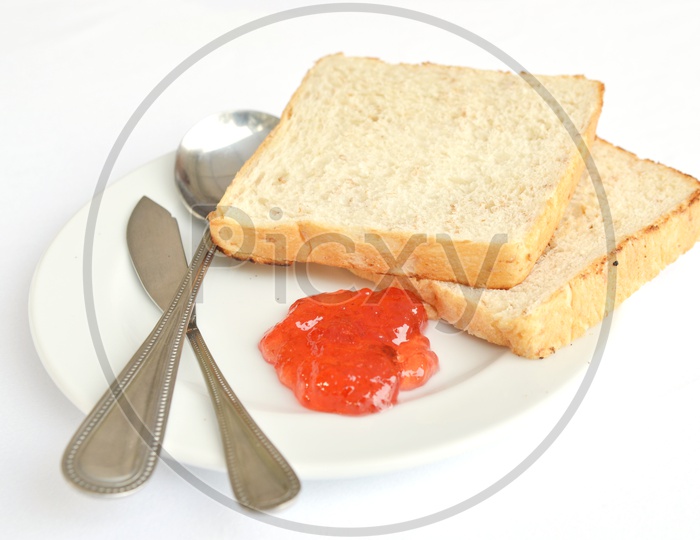 Bread Toast And Jam in a Plate