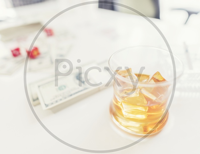 Whiskey Glass On a Gambling Table