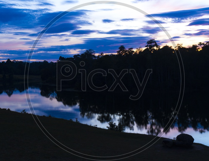 Sunset Over Tropical Lake With Bluehour Sky In  Background