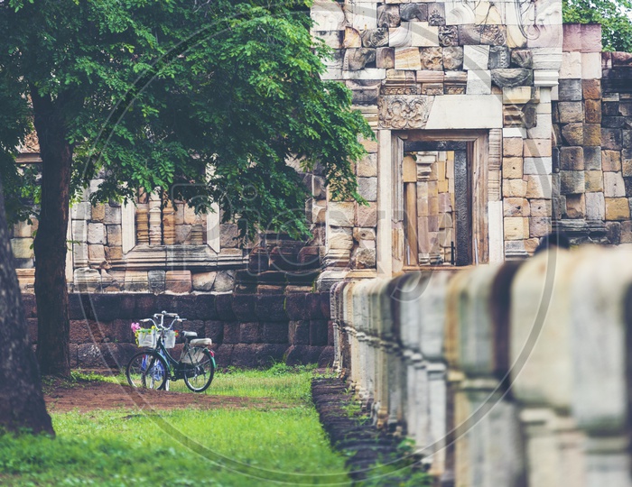 Bicycle At an Old Ancient Buddha Temple Built With Stones