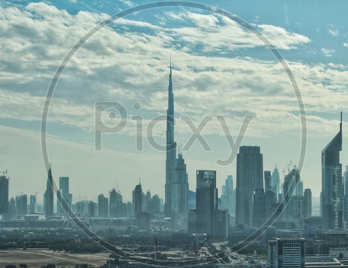 Clouds over Burj Khalifa and other buildings in Dubai