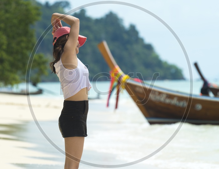 Young Girl Tourist Chilling in Phuket beach By Wearing Modern Wear