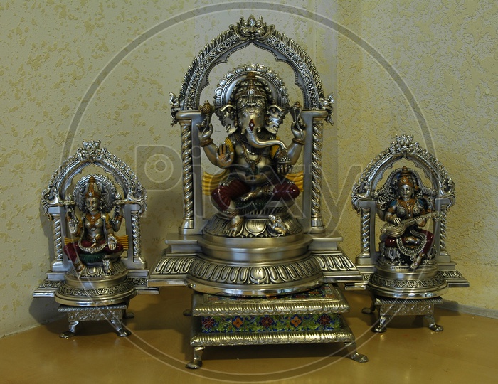 Lord Ganesh Silver Idol In a Prayer Room