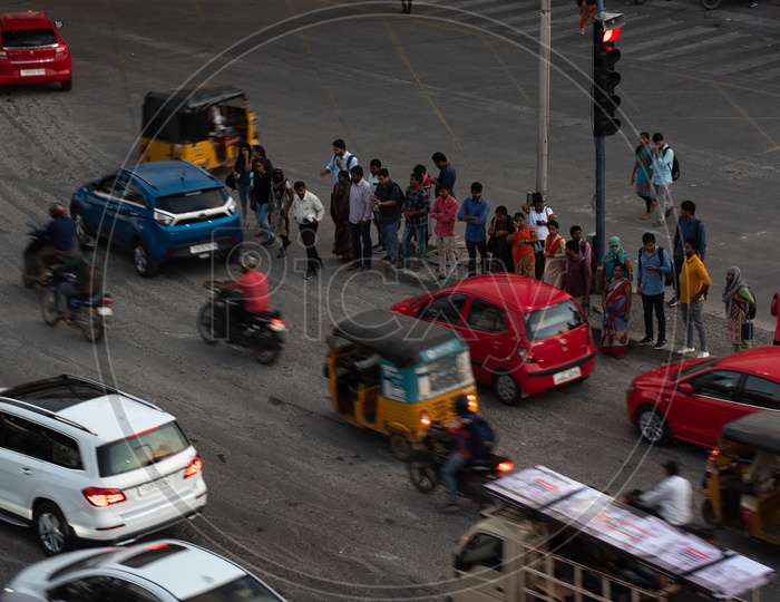 Pedestrians Waiting at a traffic Signal