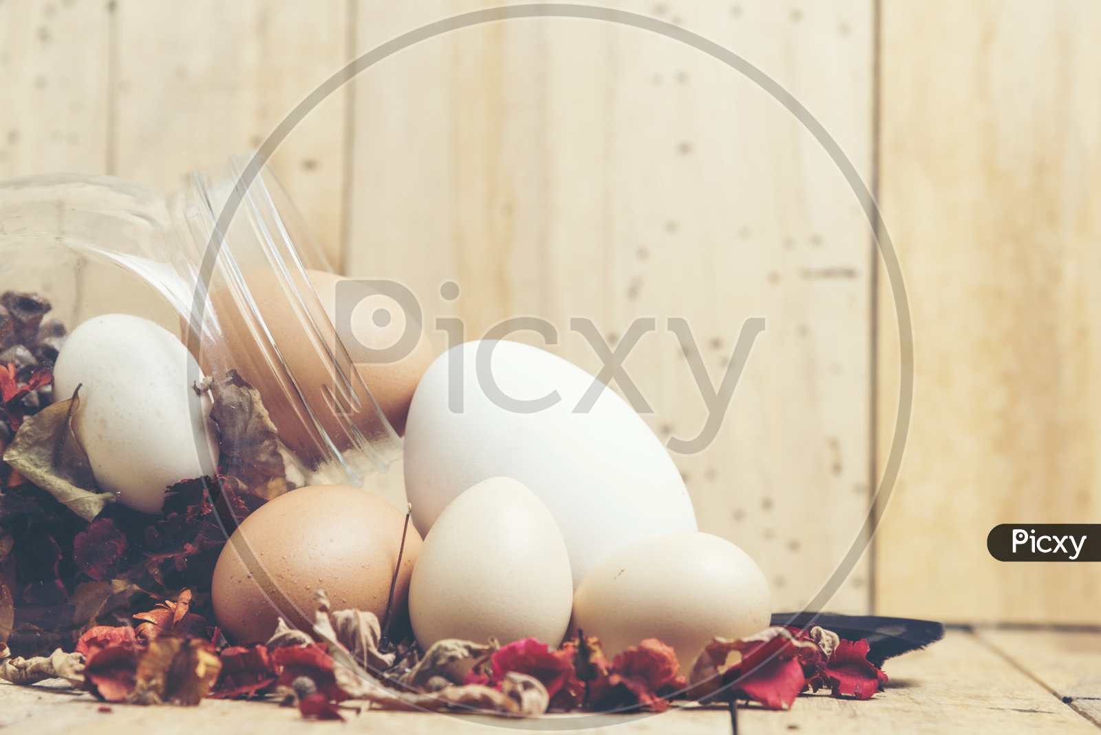 Easter festival creative Backgrounds With Easter Eggs over Wooden background And Vintage Filter