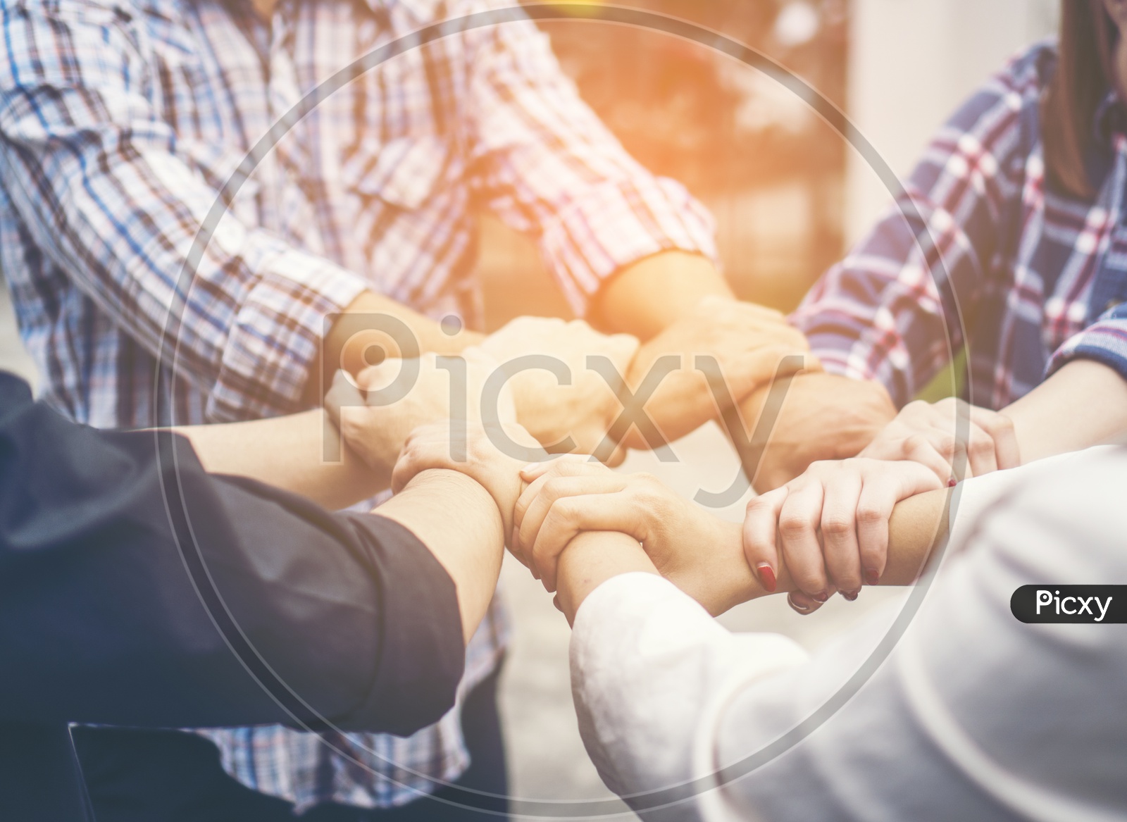 A business team cooperation resembling stack of hands